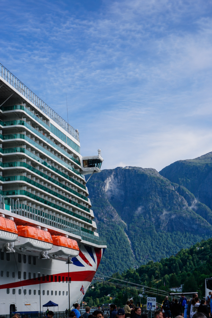 P&O Iona docked in Olden beneath the surrounding mountains