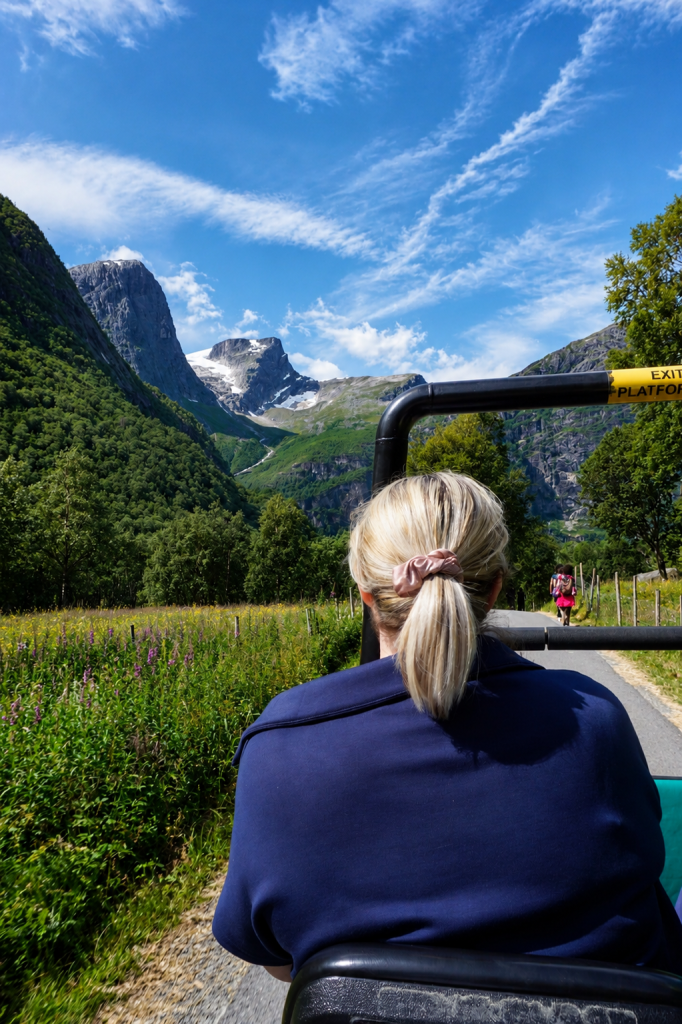 Riding a troll car through the mountain scenery towards Briksdal Glacier